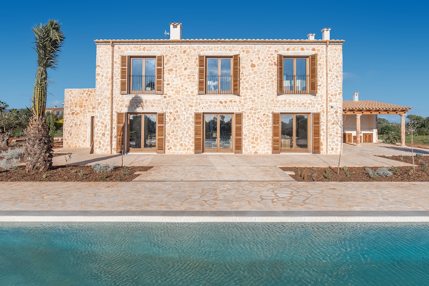 Finca mit traditioneller Natursteinfassade