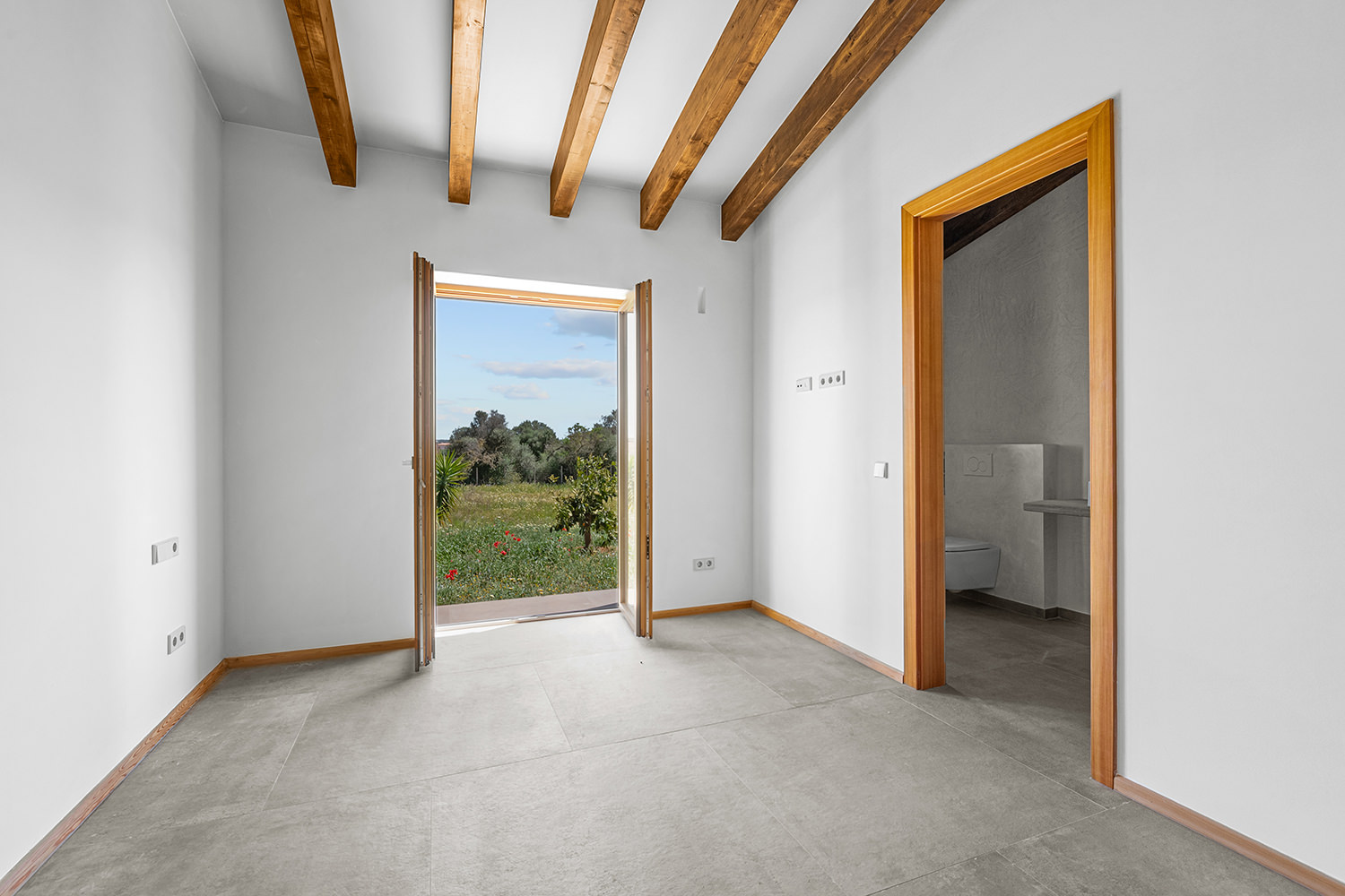 Schlafzimmer mit Bad en Suite und Ausblick